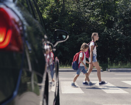students crossing the pedestrian lane