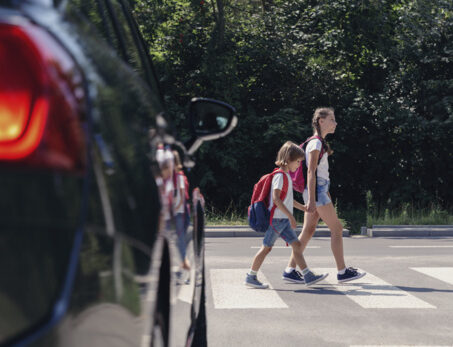 students crossing the pedestrian lane