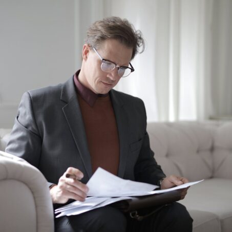 Photo by Andrea Piacquadio: https://www.pexels.com/photo/classy-executive-male-reading-papers-on-couch-3760514/