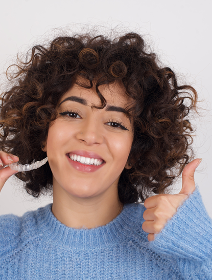 woman with her invisalign