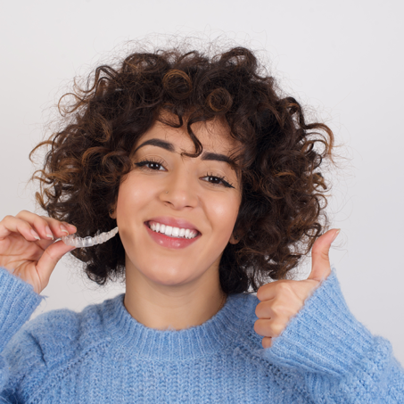 woman with her invisalign