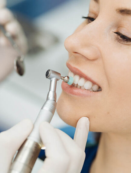 Oral hygiene, dentist doing Scaling and brushing procedure