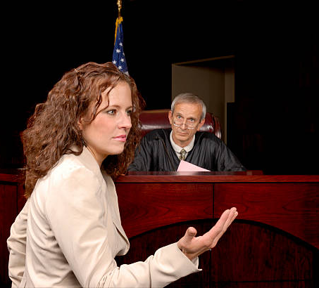 https://www.istockphoto.com/photo/presenting-her-case-to-the-judge-gm184108996-1740706
