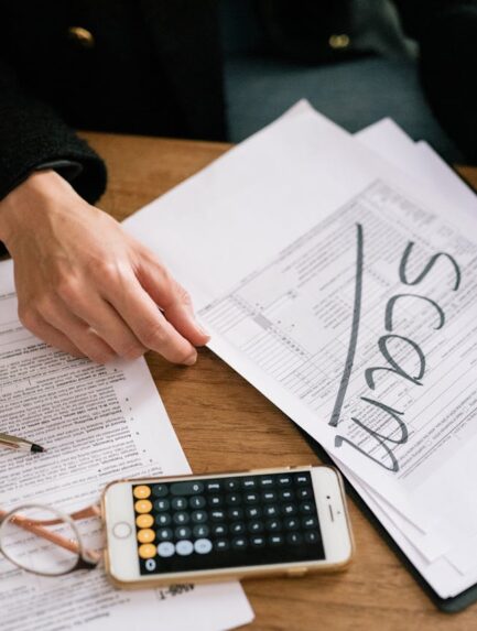 Photo by Leeloo The First: https://www.pexels.com/photo/a-person-holding-a-tax-form-7247409/
