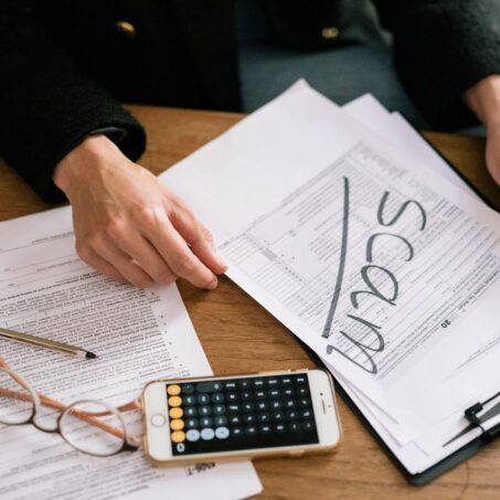 Photo by Leeloo The First: https://www.pexels.com/photo/a-person-holding-a-tax-form-7247409/