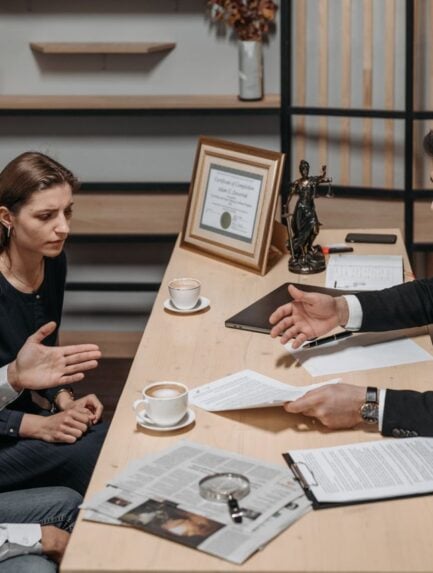 Photo by Pavel Danilyuk: https://www.pexels.com/photo/male-lawyer-talking-to-his-clients-8112231/