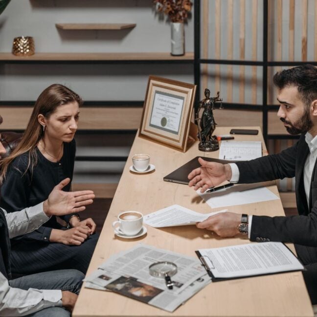 Photo by Pavel Danilyuk: https://www.pexels.com/photo/male-lawyer-talking-to-his-clients-8112231/