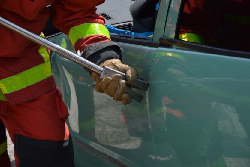 Photo by Ulrick Trappschuh: https://www.pexels.com/photo/fireman-opening-jammed-door-of-a-crushed-car-17273711/